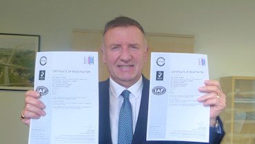Laurence Mckidd with ISO certificates
