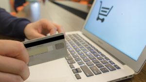 paying by card on a computer